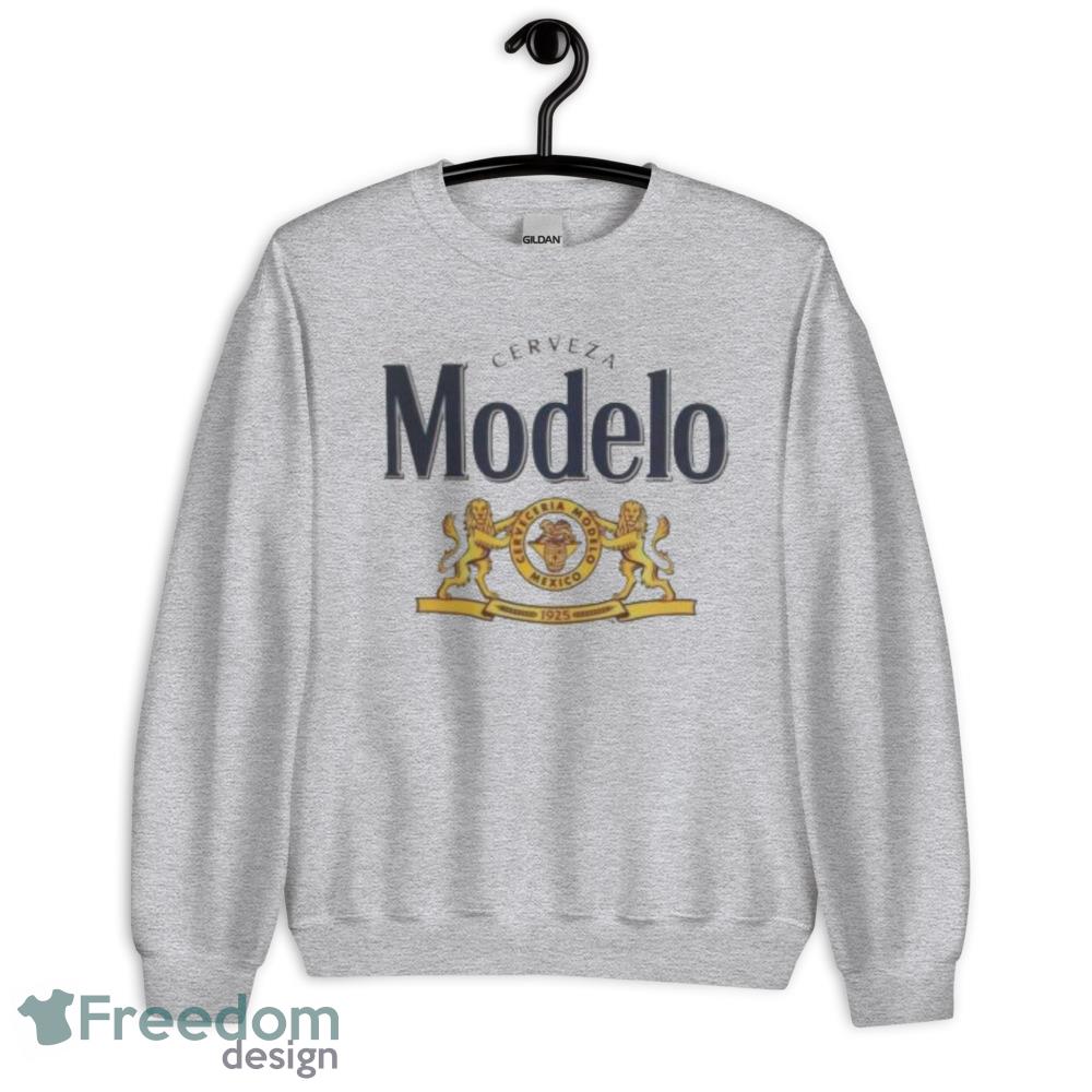 Modelo T Shirt logo the lion wins the trophy shirt - Unisex Heavy Blend Crewneck Sweatshirt Modelo T Shirt logo the lion wins the trophy shirt - Unisex Heavy Blend Crewneck Sweatshirt