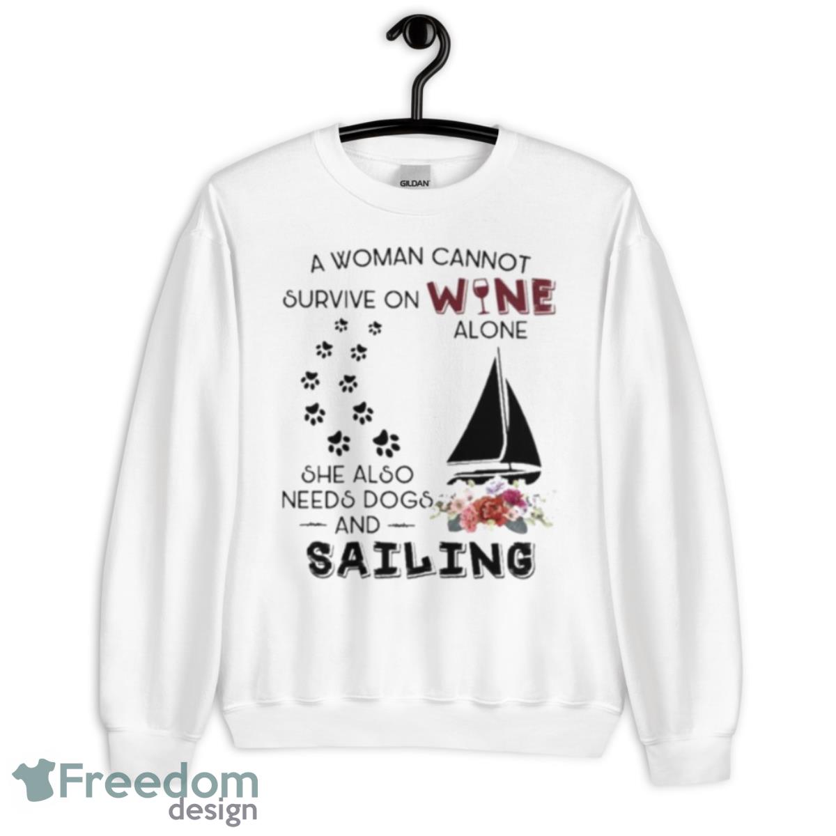 A Woman Cannot Survive On Wine Alone She Also Needs Dogs Sailing 2023 Shirt - Unisex Heavy Blend Crewneck Sweatshirt