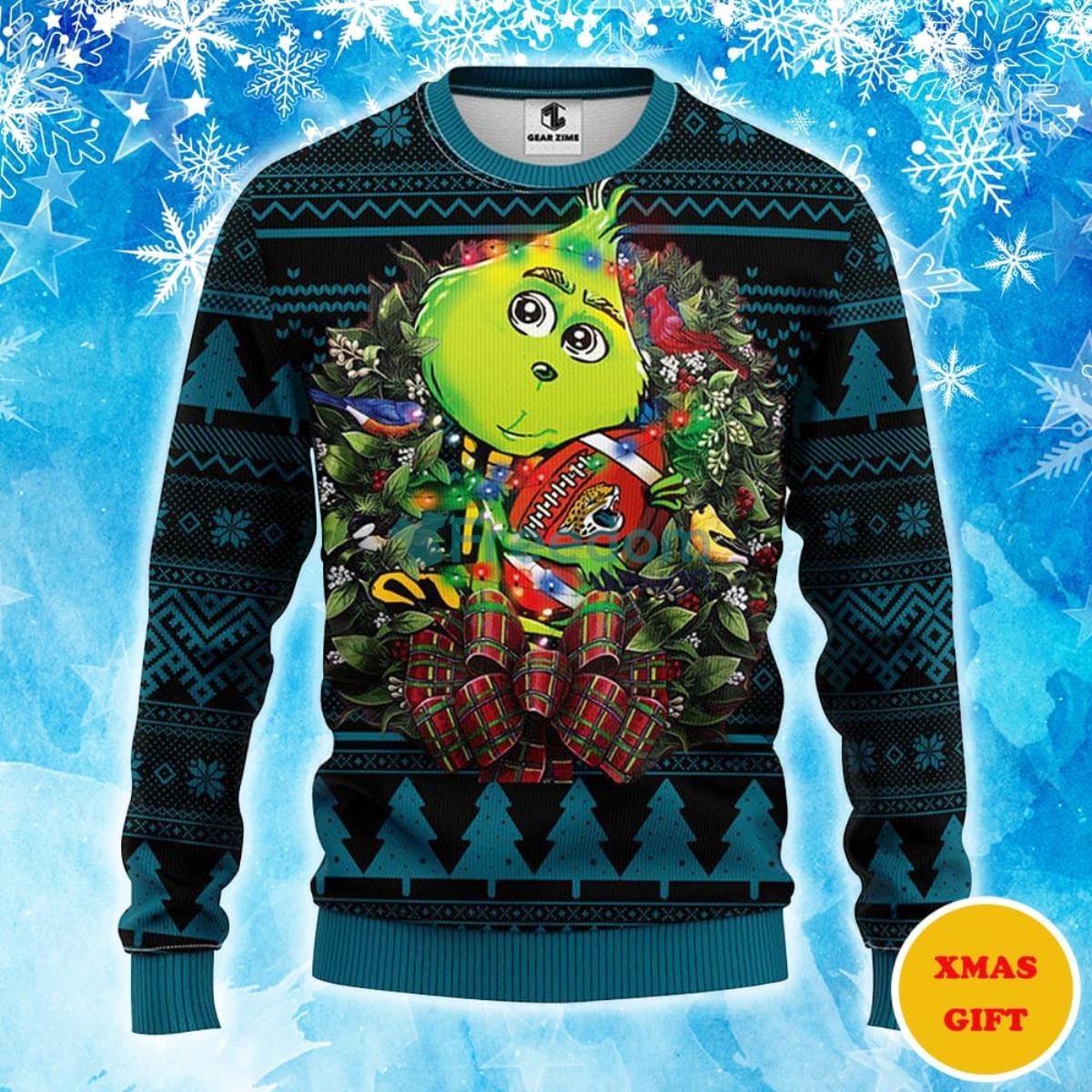 Jacksonville Jaguars Grinch Hug Christmas AOP Sweater Product Photo 1