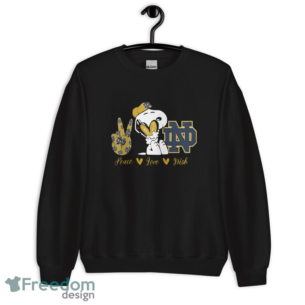 Snoopy Peace Love Notre Dame Fighting Irish T Shirt, Christmas Sweatshirt image Snoopy Peace Love Notre Dame Fighting Irish T Shirt, Christmas Sweatshirt - 18000 Unisex Heavy Blend Crewneck Sweatshirt
