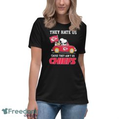 Official Peanuts Snoopy And Woodstock Driving Car Kansas City Chiefs The Y Hate Is ’cause They Ain’t Us Shirt - Women's Relaxed Short Sleeve Jersey Tee