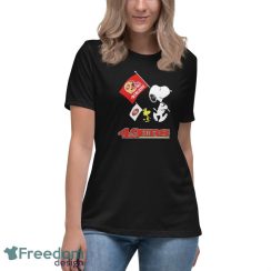 Official The Peanuts Snoopy And Woodstock San Francisco 49ers Football Flag Shirt - Women's Relaxed Short Sleeve Jersey Tee