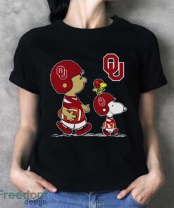 Official The Peanuts Charlie Brown Snoopy Woodstock Oklahoma Sooners Football Shirt image Official The Peanuts Charlie Brown Snoopy Woodstock Oklahoma Sooners Football Shirt - Ladies T-Shirt