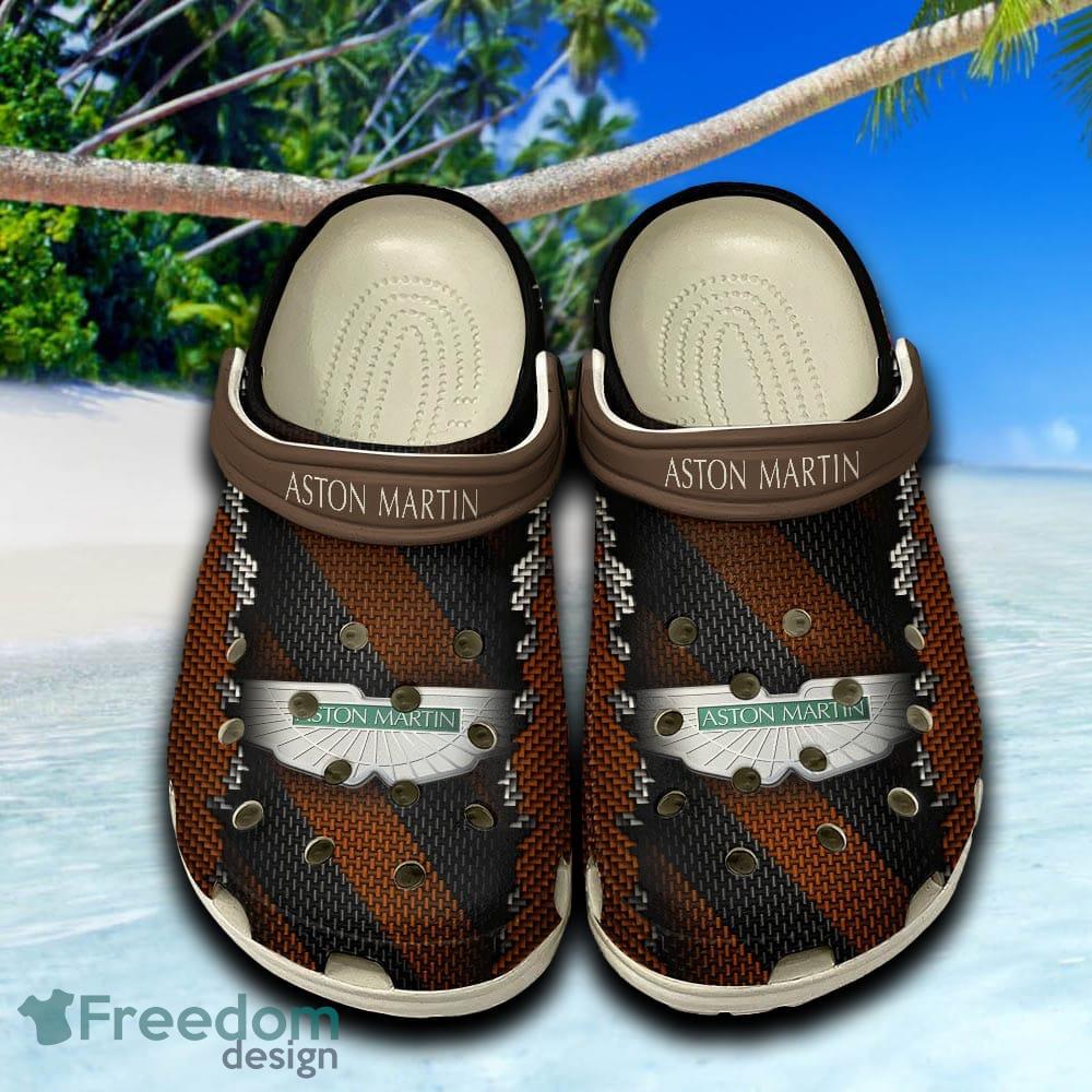 Aston Martin Unique Clogs Shoes Brown Beach Logo Car For Fans Hot Holidays Gift Clogs Shoes image Aston Martin Unique Clogs Shoes Brown Beach Logo Car For Fans Hot Holidays Gift Clogs Shoes - Aston Martin Unique Clogs Shoes Brown Beach Logo Car For Fans Hot Holidays Gift Clogs Shoes