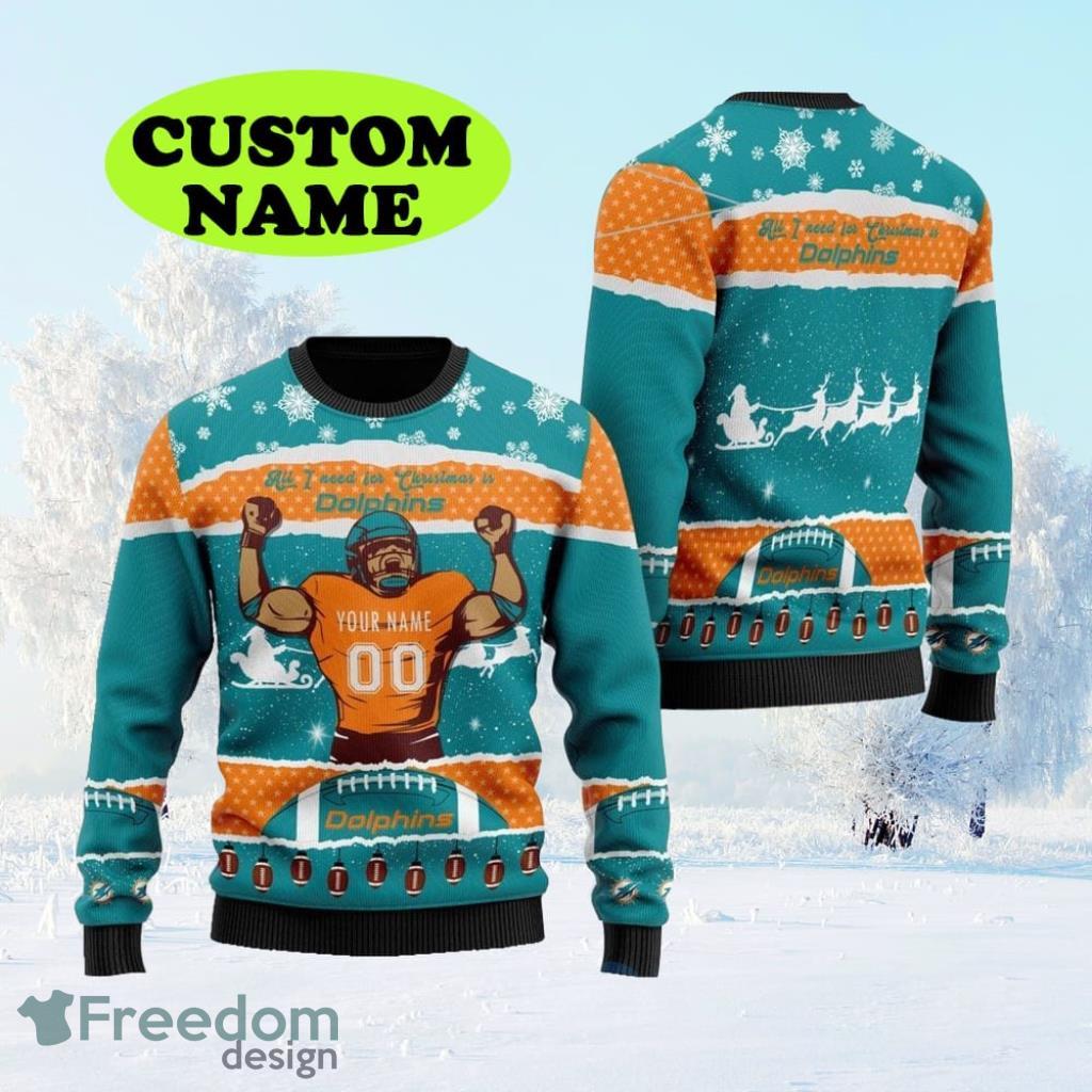Personalized NFL Miami Dolphins All I Need For Christmas Ugly Christmas Sweater Perfect Gift For Football Big Fans image Personalized NFL Miami Dolphins All I Need For Christmas Ugly Christmas Sweater Perfect Gift For Football Big Fans Product Photo 1