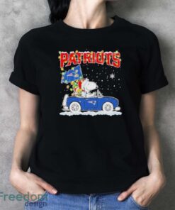 Design Snoopy And Woodstock santa car New England Patriots flag christmas shirt - Ladies T-Shirt