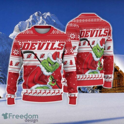 NCAA New Jersey Devils Football Fans Sweater Grinch Ugly Sweater Christmas Funny Gift Product Photo 1