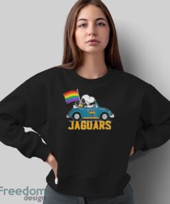 Official NFL Jacksonville Jaguars Snoopy and Woodstock driving car Pride Month 2024 t-shirt - Sweatshirt