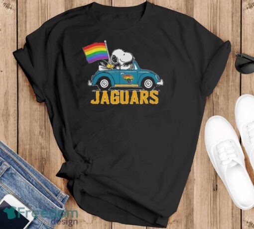 Official NFL Jacksonville Jaguars Snoopy and Woodstock driving car Pride Month 2024 t-shirt - Black T-Shirt