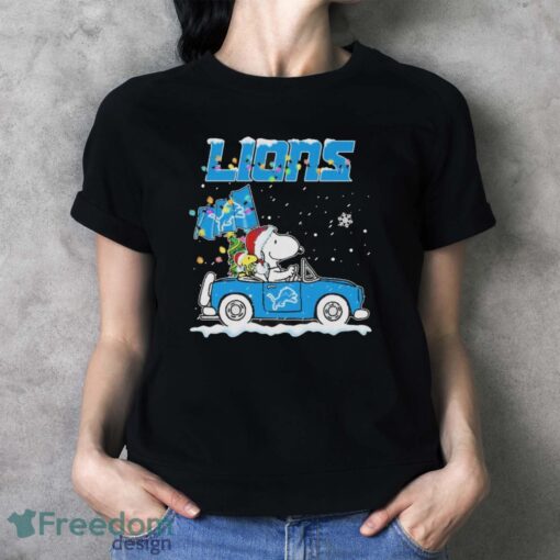 Official Peanuts Snoopy And Woodstock Drive Car Detroit Lions Christmas Shirt - Ladies T-Shirt