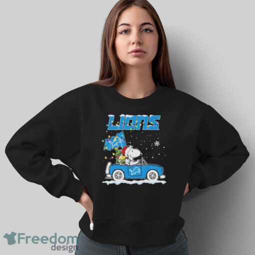 Official Peanuts Snoopy And Woodstock Drive Car Detroit Lions Christmas Shirt - Sweatshirt