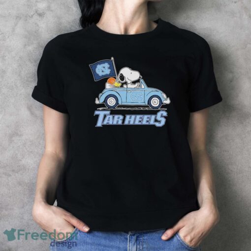 Peanuts Snoopy And Woodstock North Carolina Tar Heels On Car Shirt - Ladies T-Shirt